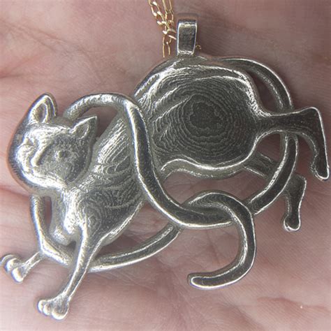 Adorning Yourself with the Shy Kitty Talisman: A Path to Confidence